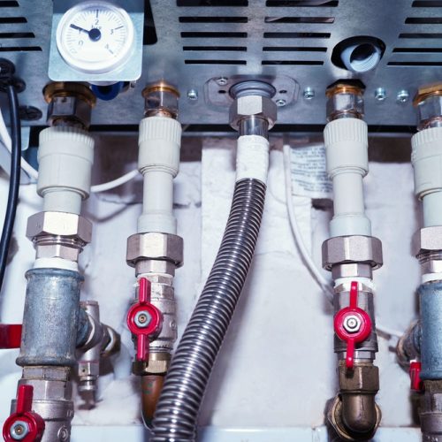 Plumbing,Connections,Of,A,Modern,Domestic,Double-circuit,Gas,Boiler,,Water